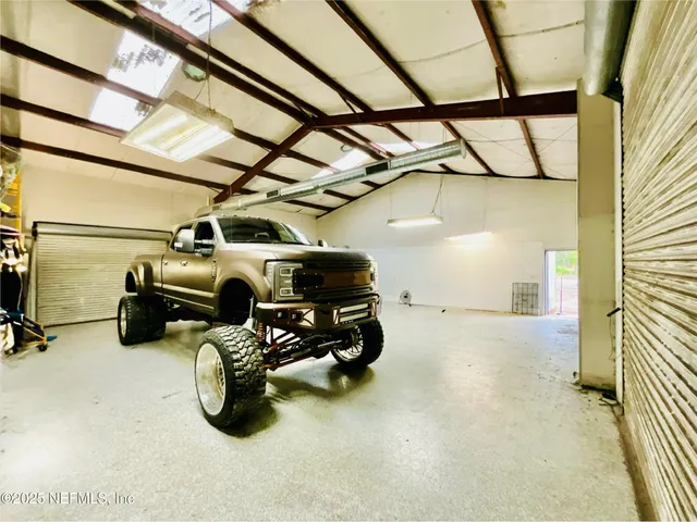 a view of a backyard with plants