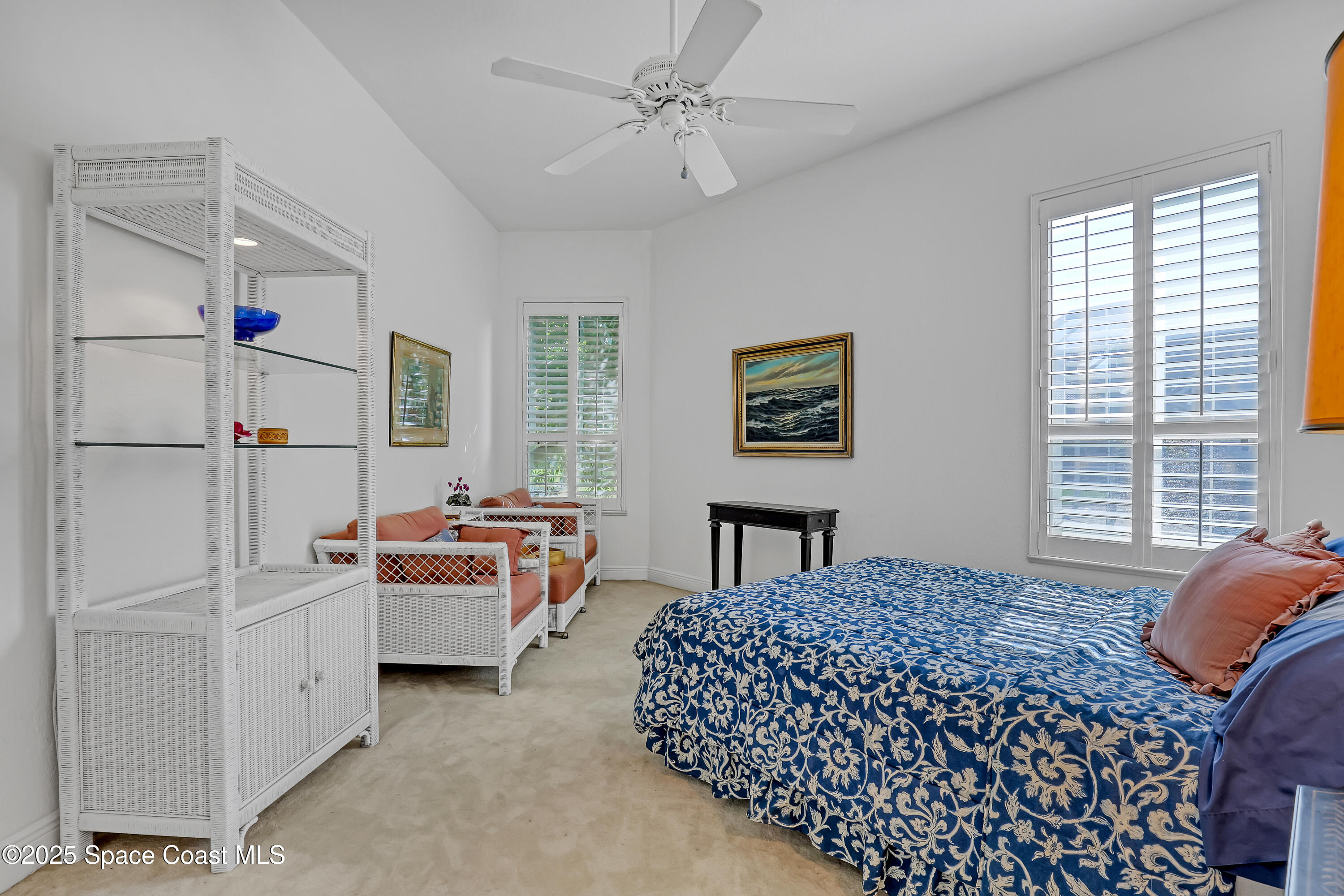 813 Hogan Way Melbourne, FL 32940 - Photo 21 of 50 a bedroom with a bed furniture and a window