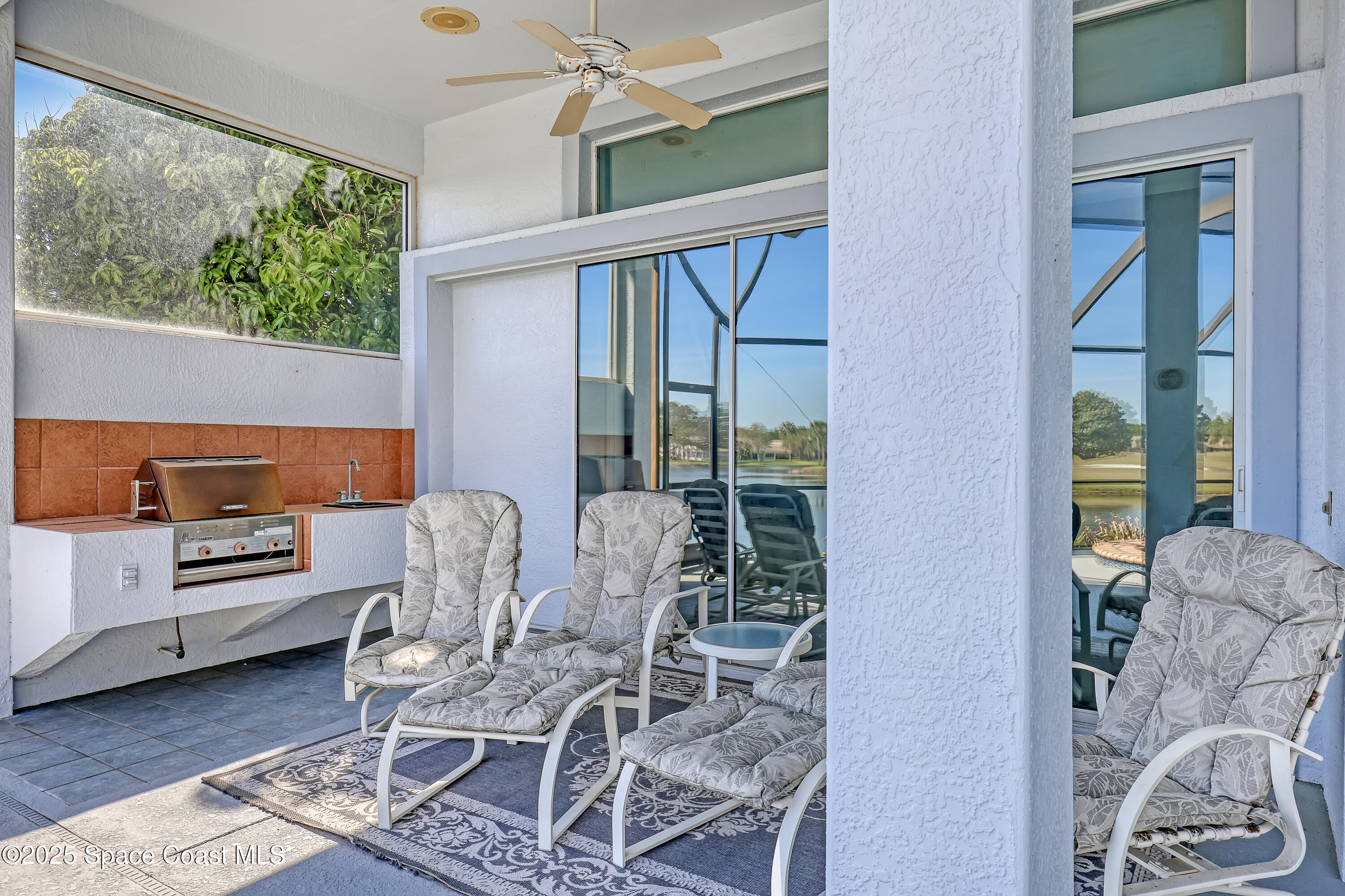 813 Hogan Way Melbourne, FL 32940 - Photo 36 of 50 a work room with furniture and a window