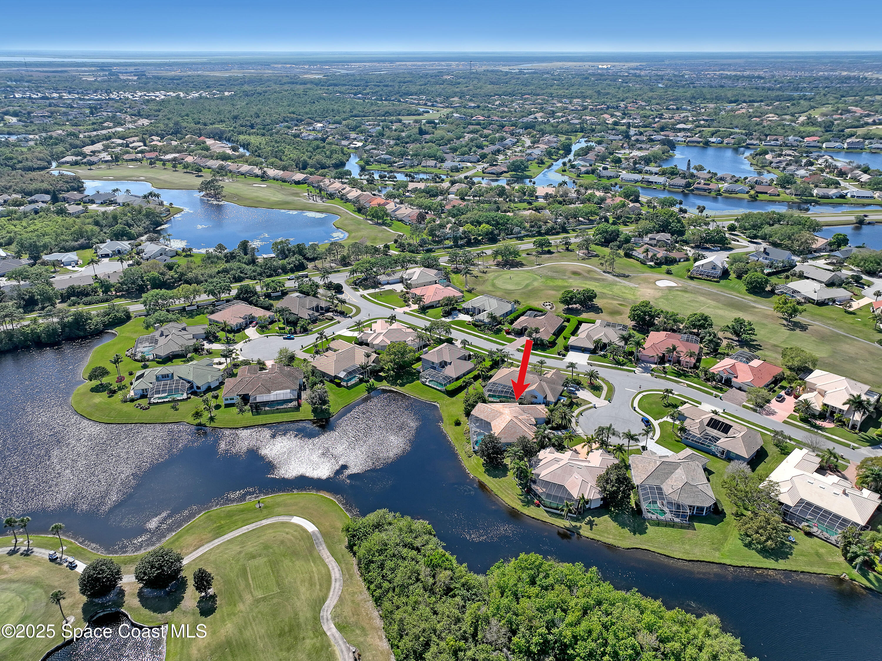 813 Hogan Way Melbourne, FL 32940 - Photo 45 of 50 an aerial view of a house with a swimming pool yard and outdoor seating