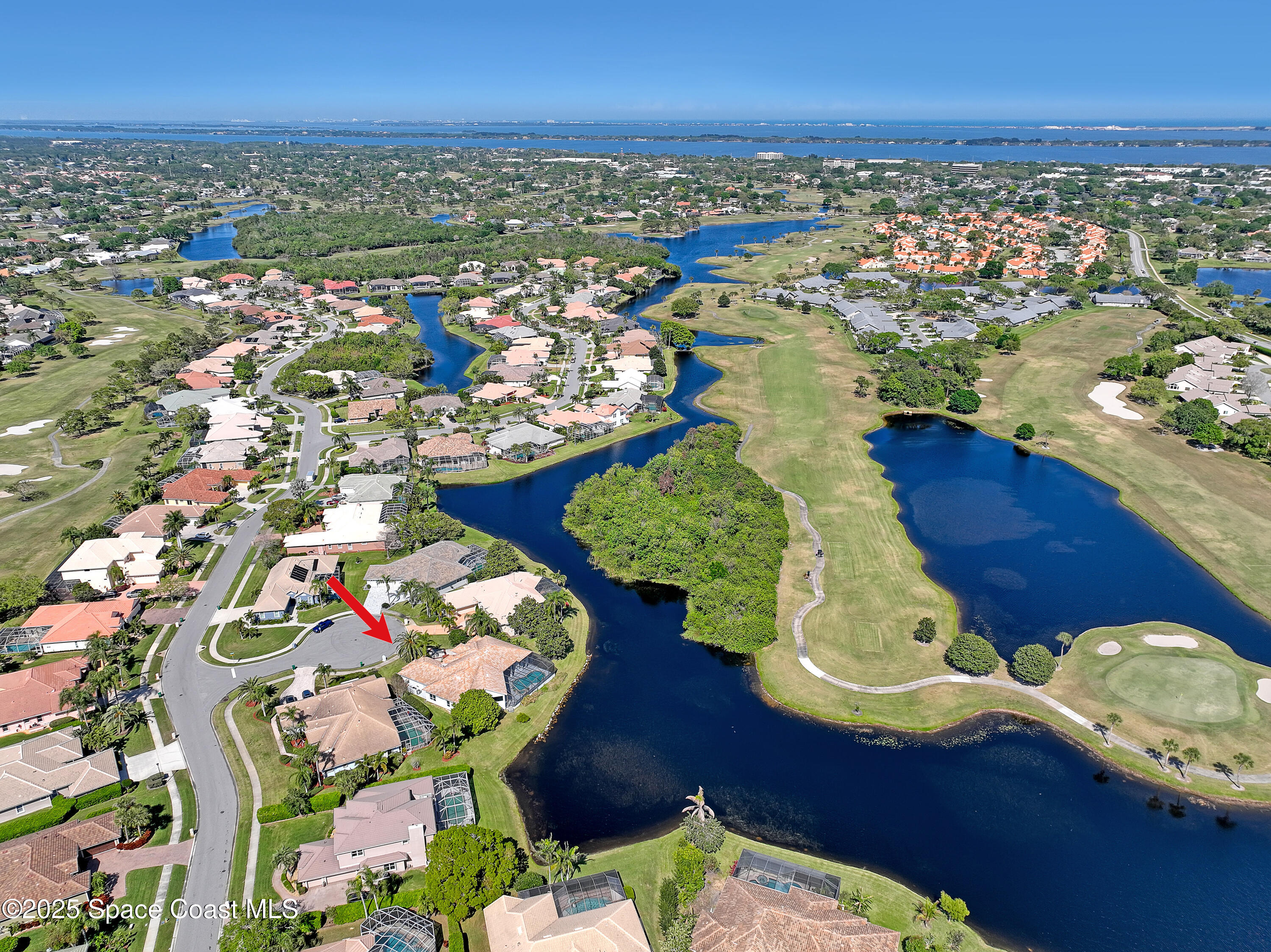 813 Hogan Way Melbourne, FL 32940 - Photo 46 of 50 an aerial view of residential houses with outdoor space