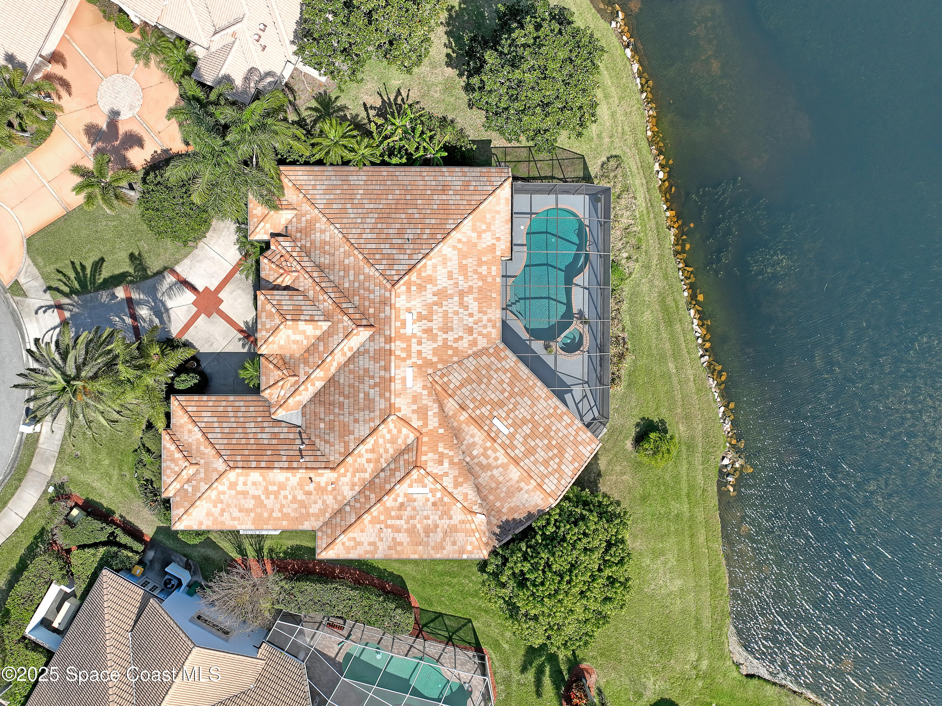 813 Hogan Way Melbourne, FL 32940 - Photo 47 of 50 an aerial view of a house with a yard and plants