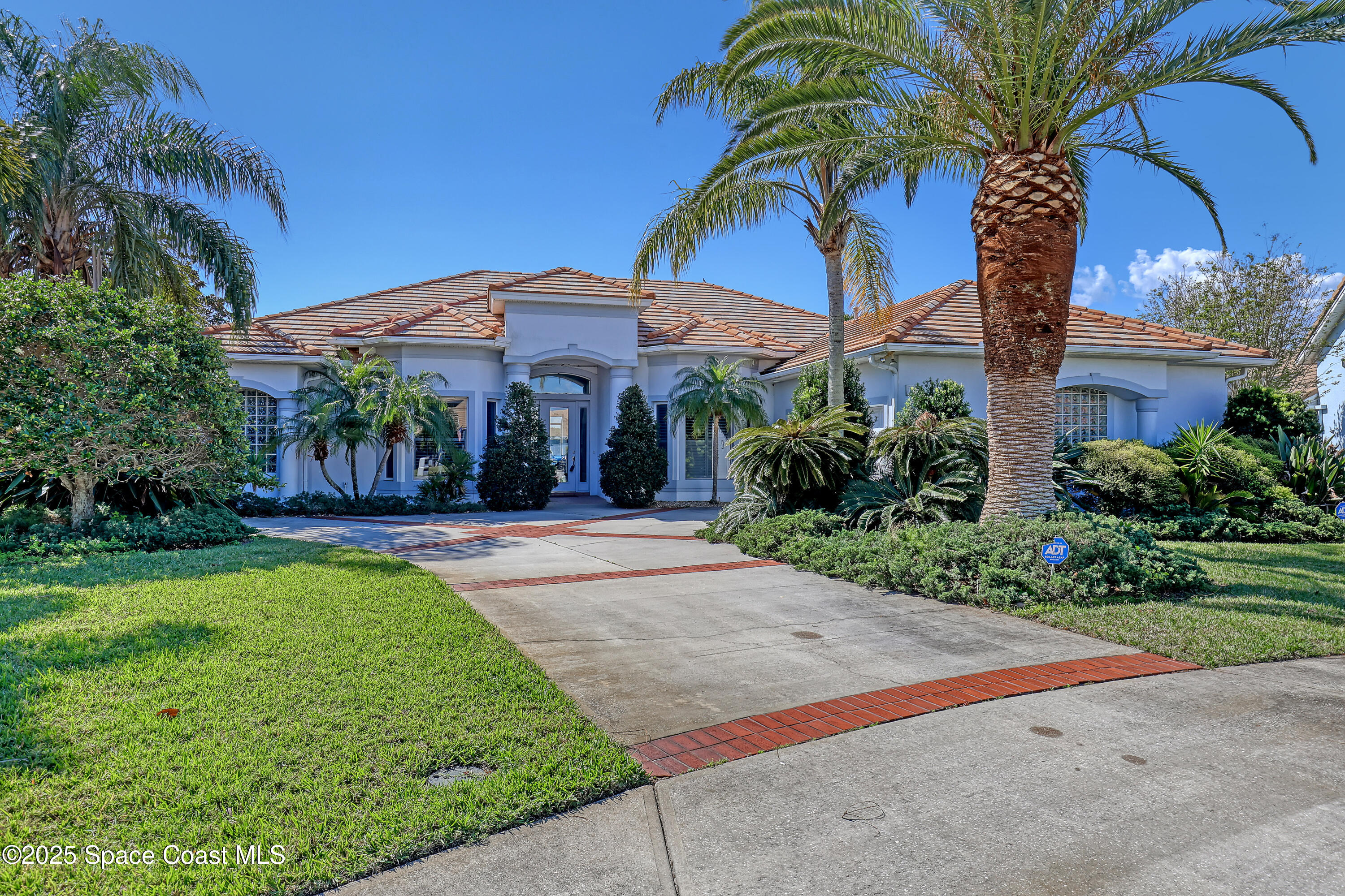 813 Hogan Way Melbourne, FL 32940 - Photo 50 of 50 a view of a house with a yard and sitting area
