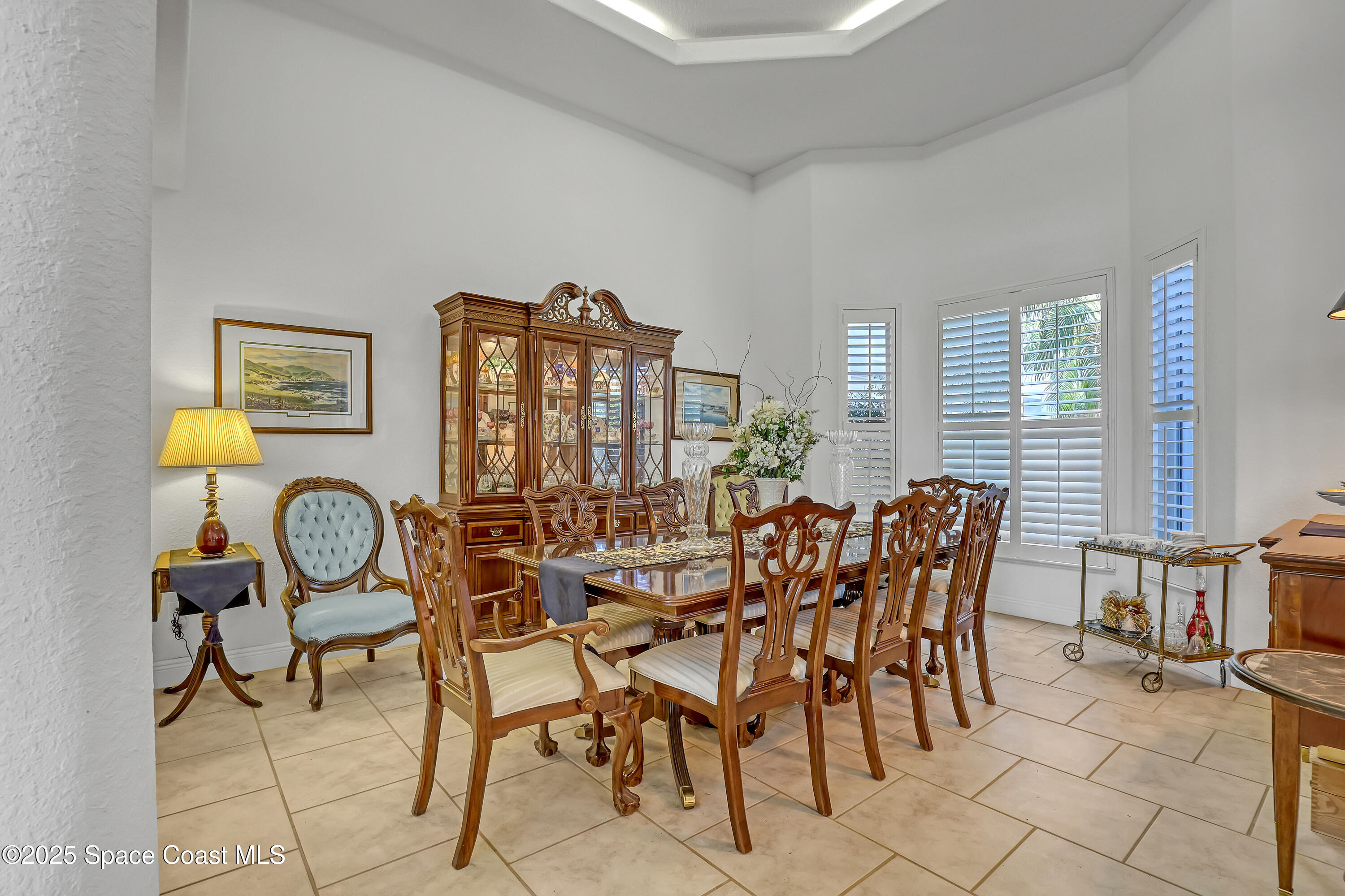 813 Hogan Way Melbourne, FL 32940 - Photo 10 of 50 a view of a livingroom with furniture and window