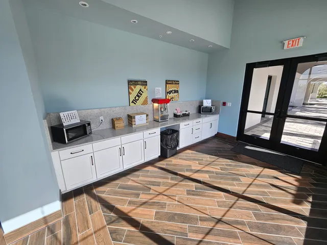 a bed room with a bed and a window