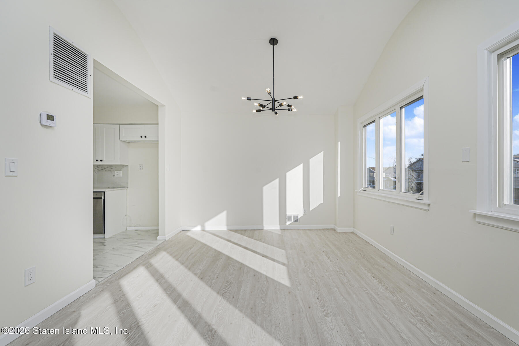 39 Commerce Street Staten Island, NY 10314 - Photo 12 of 49 a view of a room with a staircase