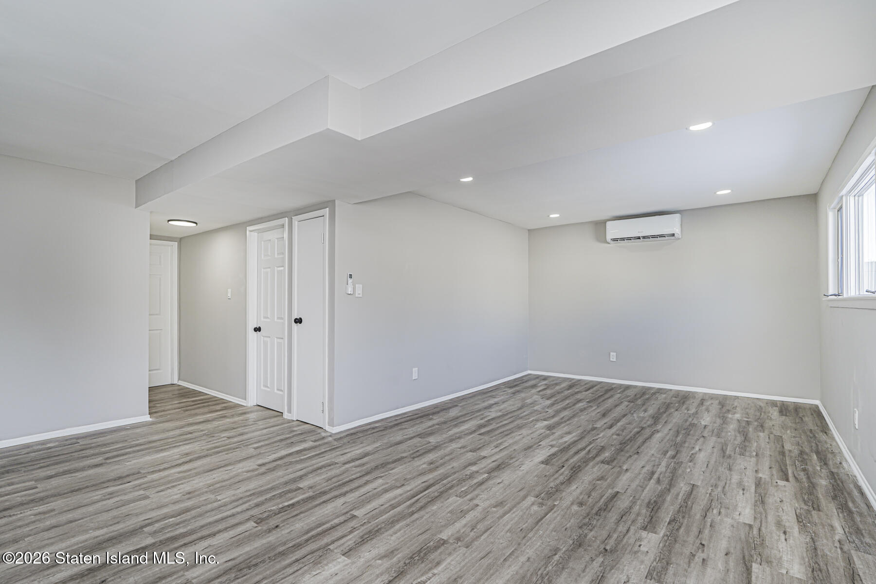 39 Commerce Street Staten Island, NY 10314 - Photo 38 of 49 a view of room with wooden floor