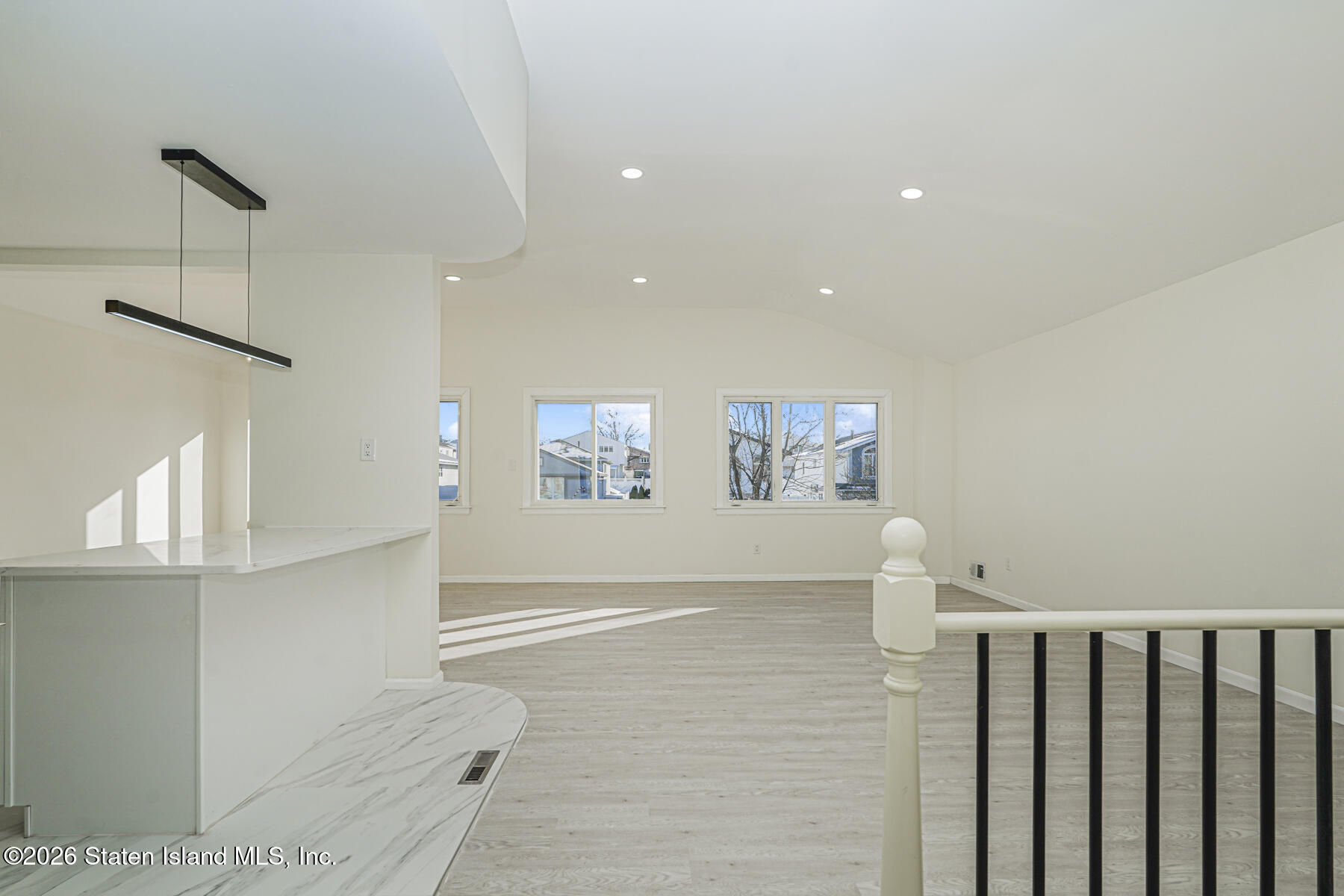 39 Commerce Street Staten Island, NY 10314 - Photo 6 of 49 a view of a hallway with workspace