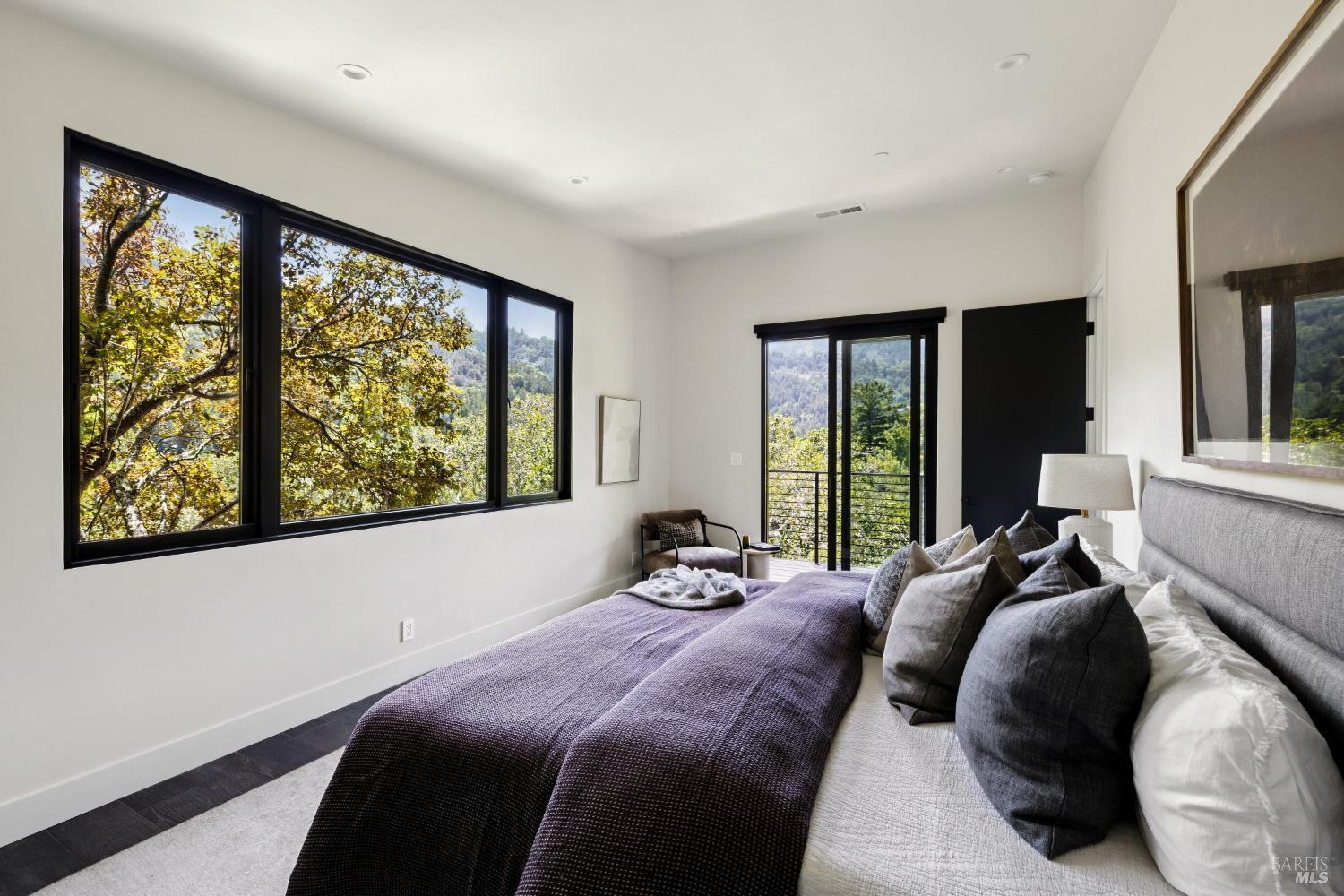 56 Millard Road Larkspur, CA 94939 - Photo 33 of 74 a bedroom with a bed and a large window
