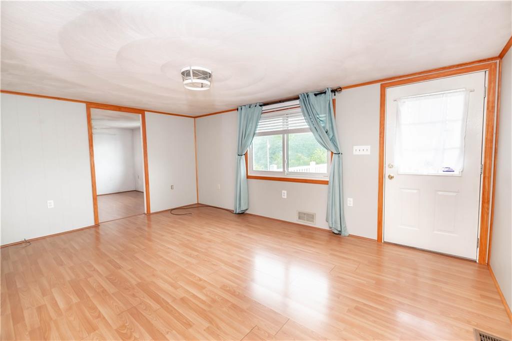 105 Dark Hollow Road Indiana, PA 15701 - Photo 28 of 44 a view of an empty room with a window
