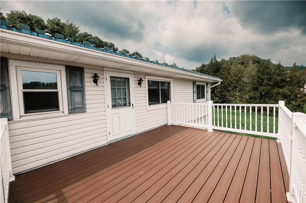 105 Dark Hollow Road Indiana, PA 15701 - Photo 6 of 44 a view of a house with wooden deck