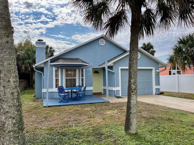 a view of a house with a patio