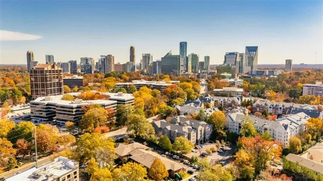 a view of a city with tall buildings