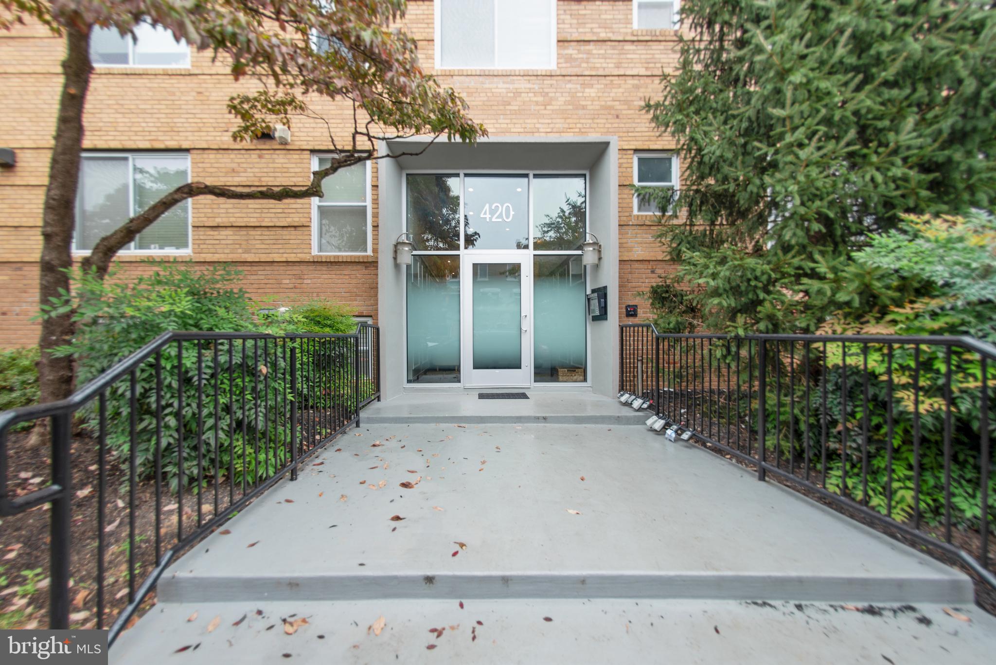 420 16th Street Southeast, Unit 306 Washington, DC 20003 - Photo 2 of 32 front view of a house with a garden