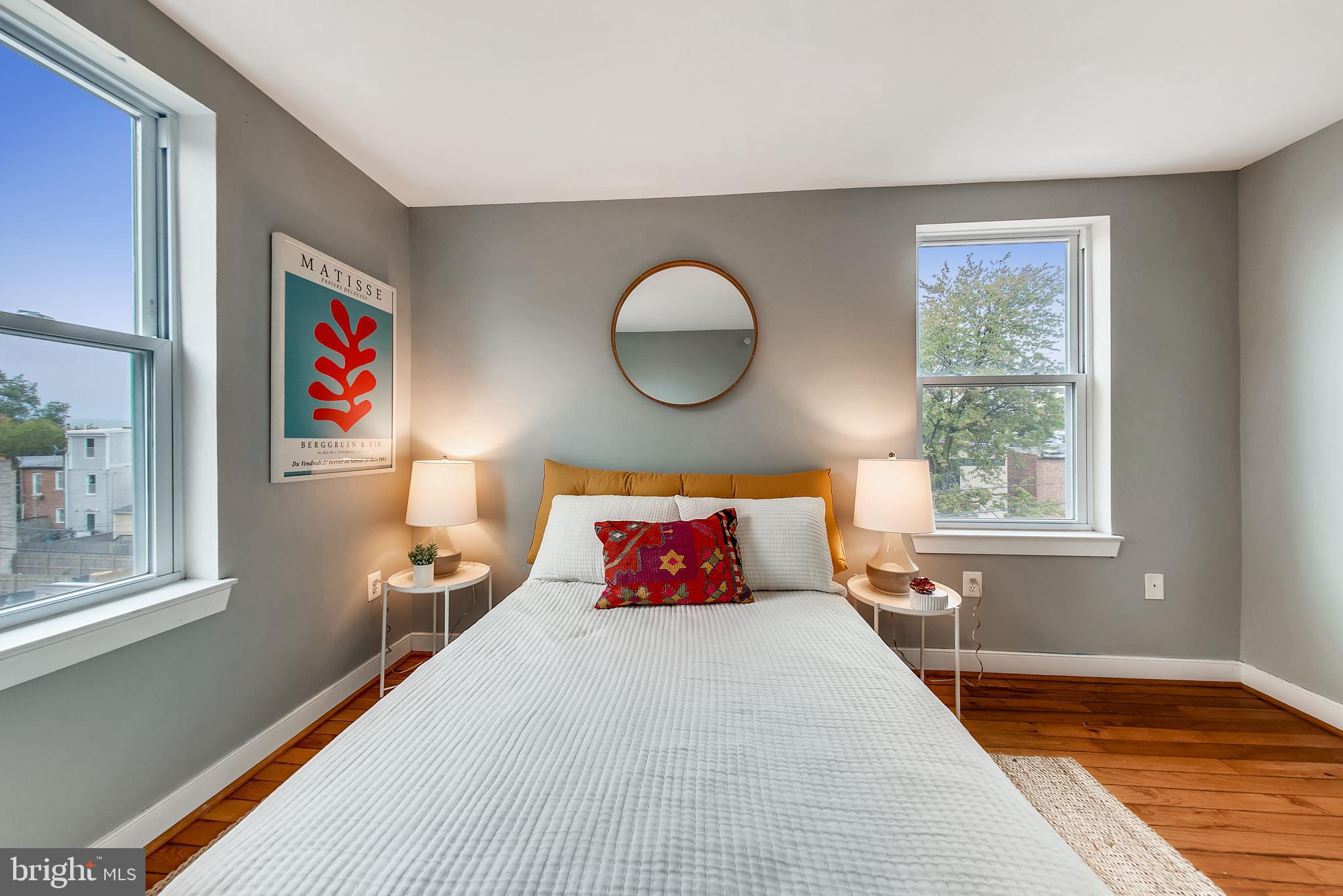 420 16th Street Southeast, Unit 306 Washington, DC 20003 - Photo 28 of 32 a bedroom with a large bed and a window