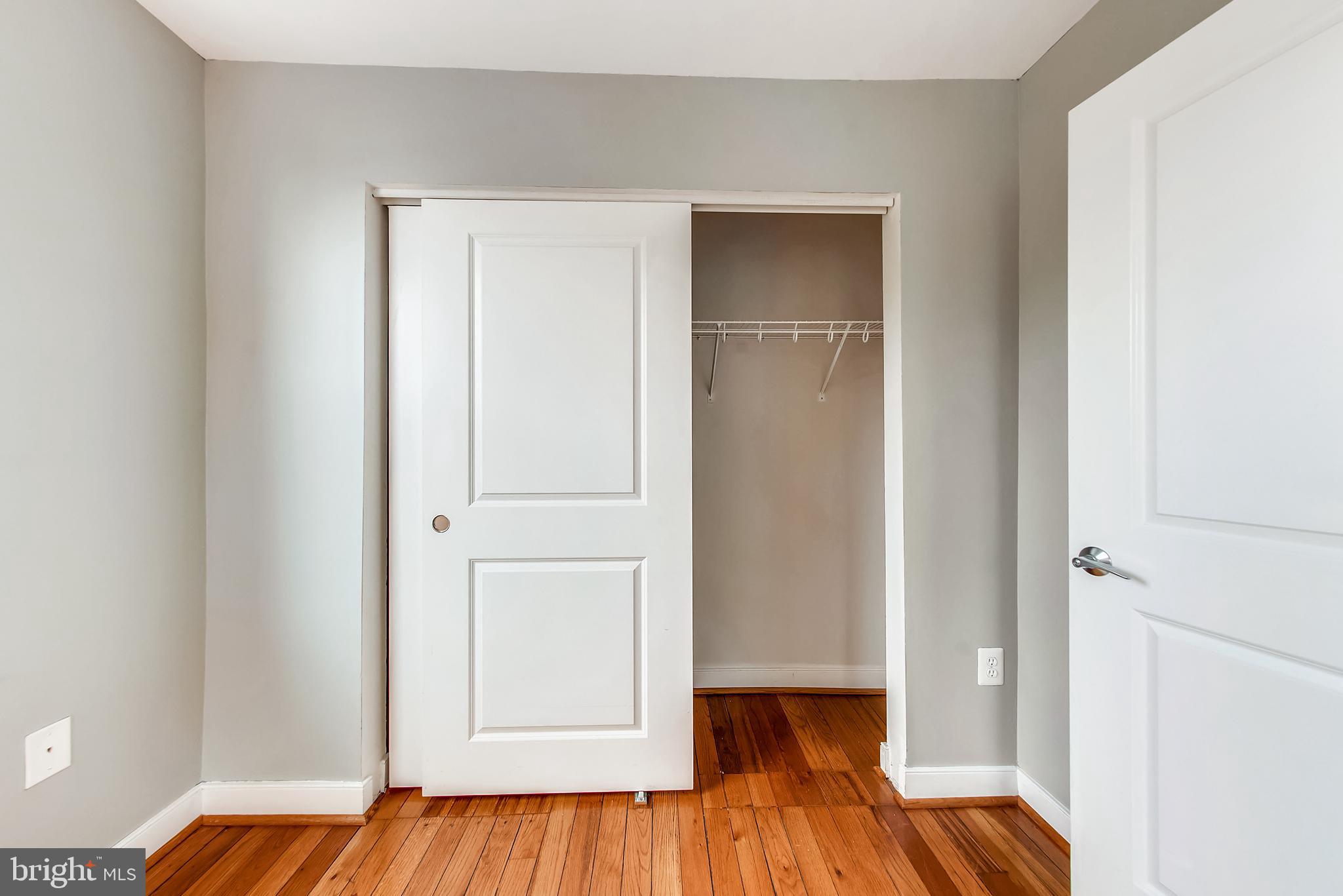 420 16th Street Southeast, Unit 306 Washington, DC 20003 - Photo 29 of 32 a view of hallway with wooden floor