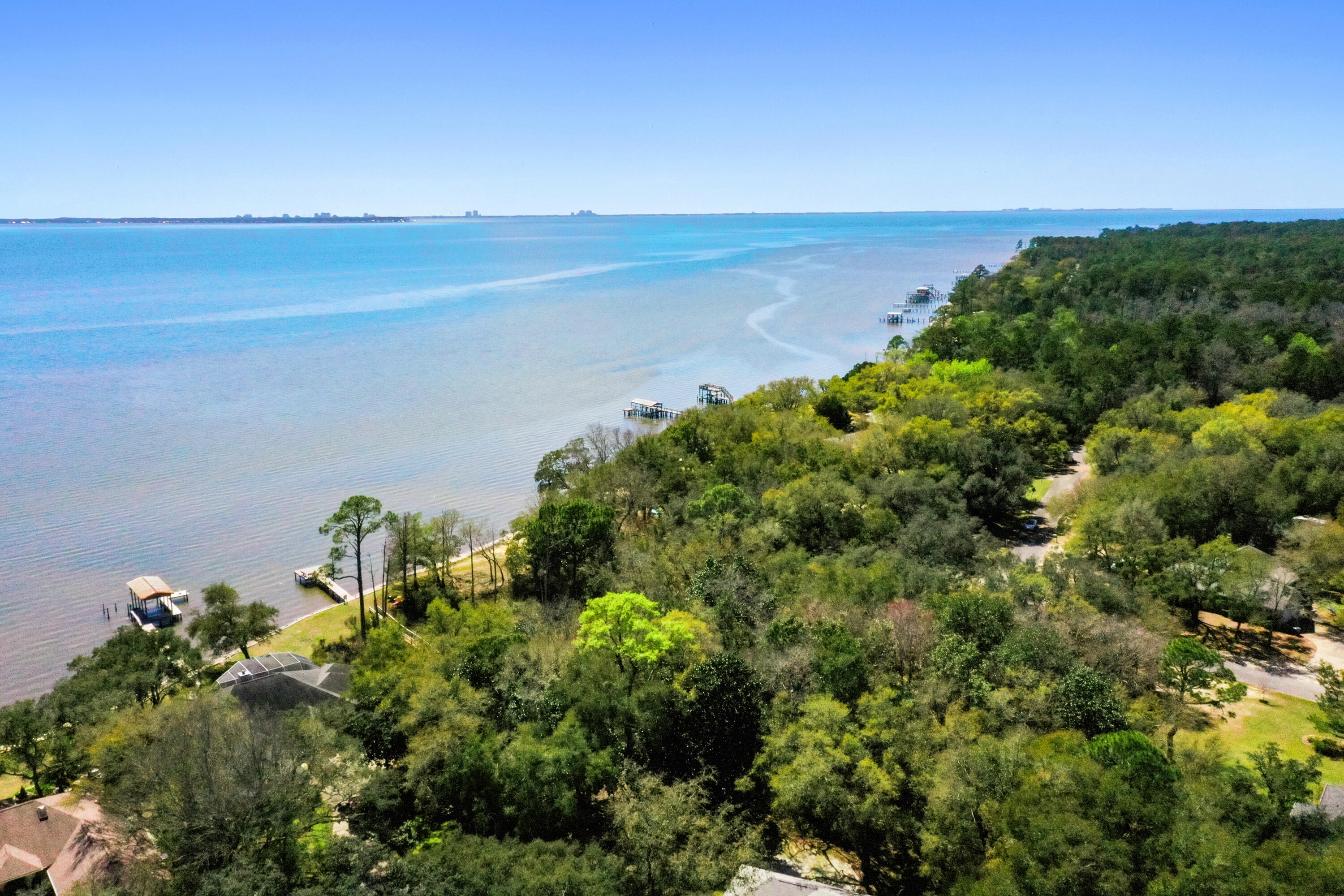 Lot 9 Cedar Beach Cove Freeport, FL 32439 - Photo 12 of 41 a view of a lake with a building in back