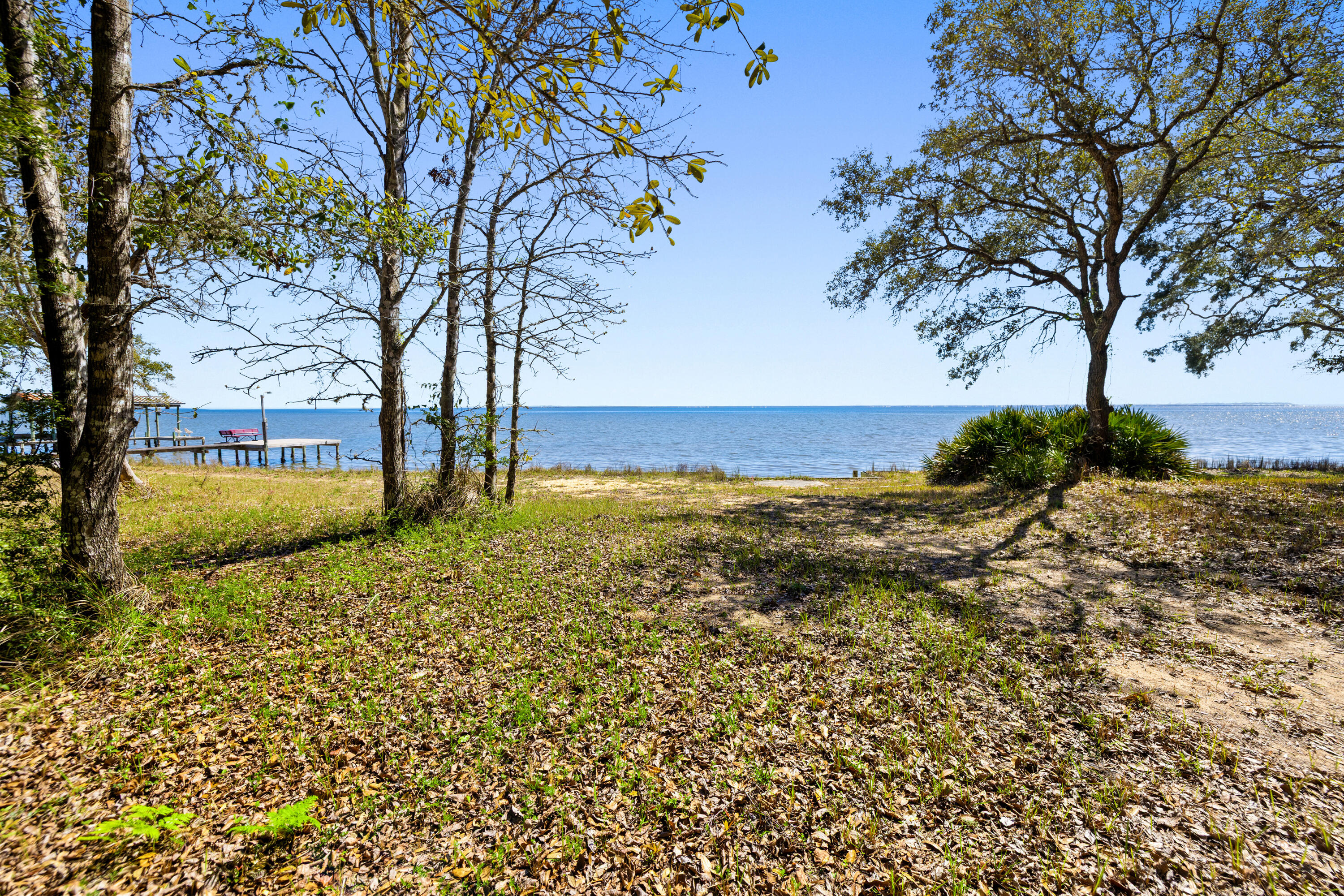 Lot 9 Cedar Beach Cove Freeport, FL 32439 - Photo 30 of 41 a view of backyard with tree