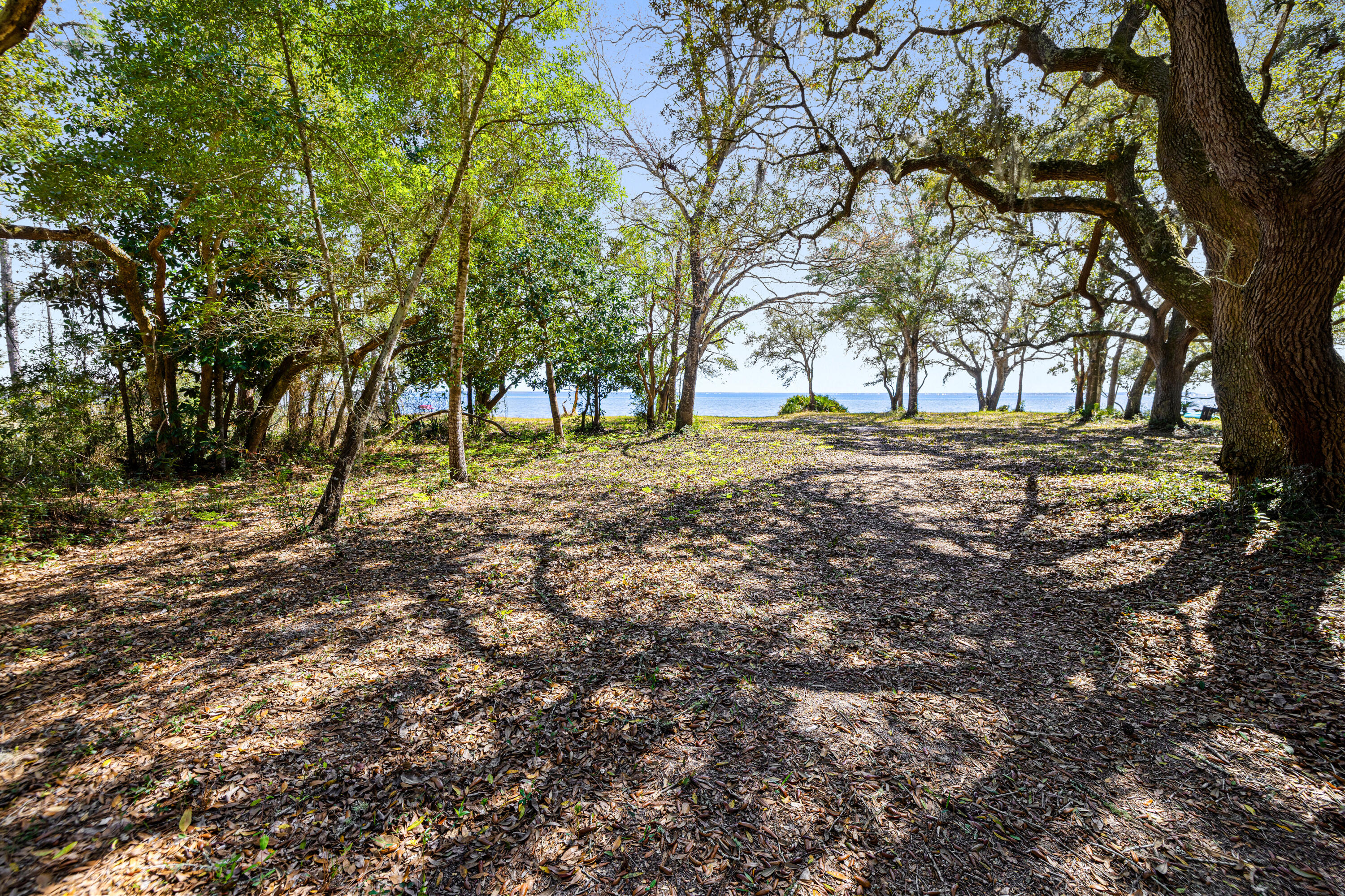 Lot 9 Cedar Beach Cove Freeport, FL 32439 - Photo 33 of 41 a big yard with lots of green space and tree