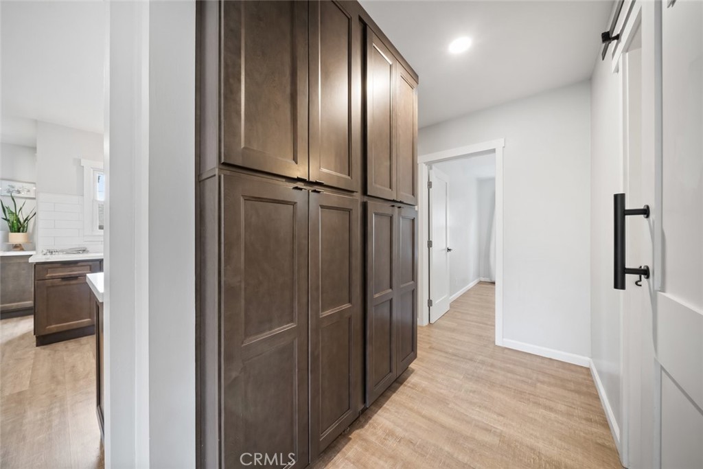 104 16th Street Paso Robles, CA 93446 - Photo 19 of 40 a view of a hallway with wooden floor