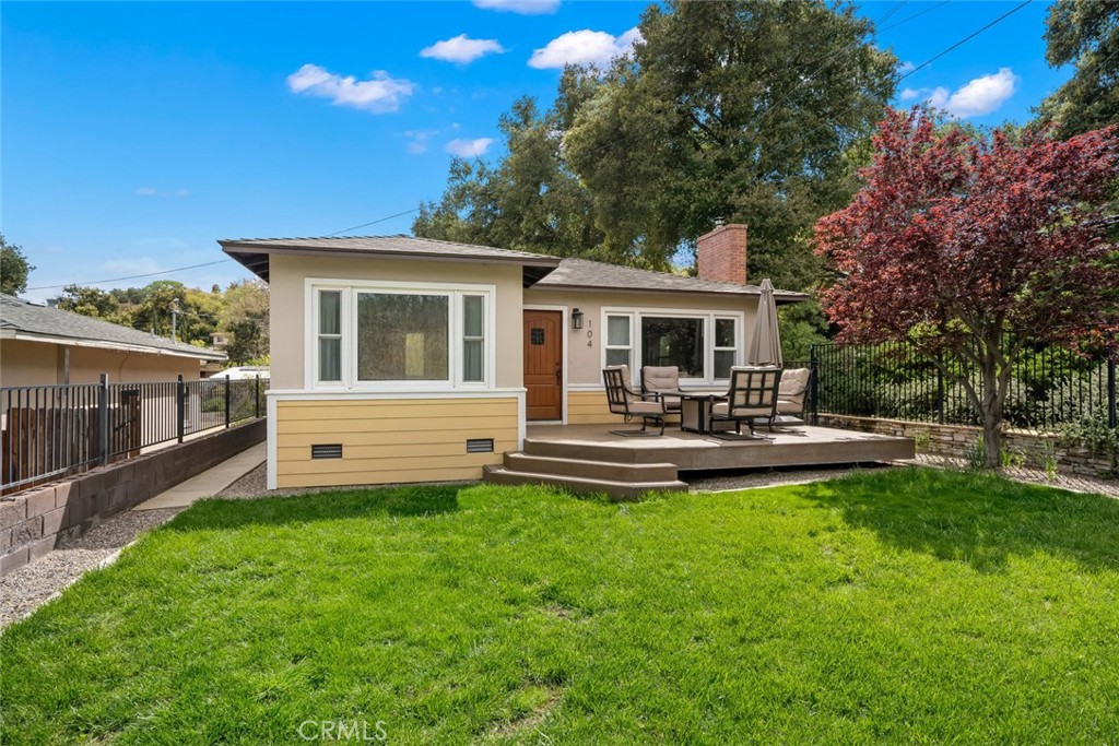 104 16th Street Paso Robles, CA 93446 - Photo 2 of 40 a view of a house with a backyard porch and sitting area
