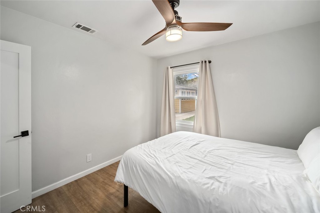 104 16th Street Paso Robles, CA 93446 - Photo 21 of 40 a bedroom with a bed and a window
