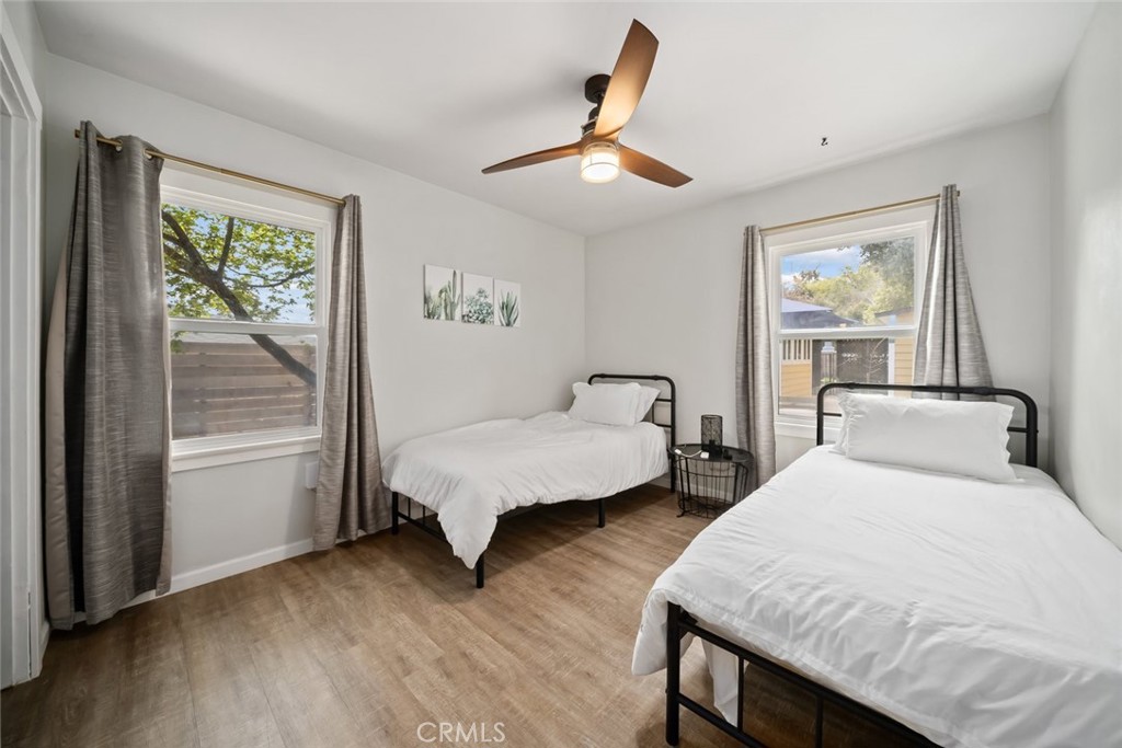 104 16th Street Paso Robles, CA 93446 - Photo 25 of 40 a bedroom with two beds and painting on the wall