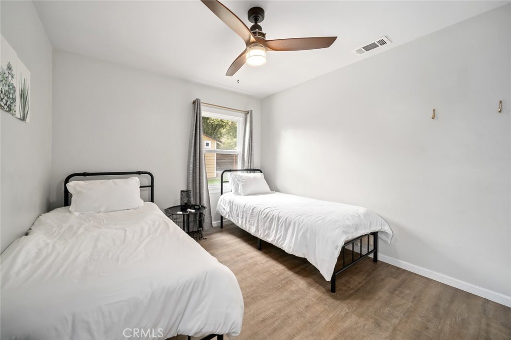 104 16th Street Paso Robles, CA 93446 - Photo 26 of 40 a bedroom with two beds and lamps