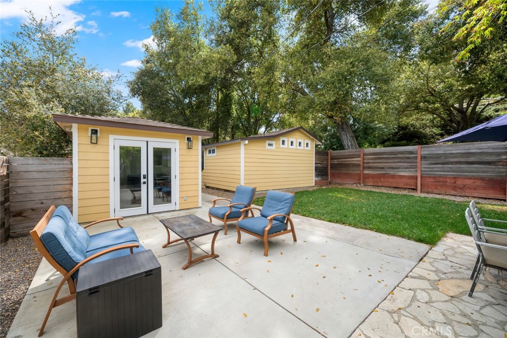 104 16th Street Paso Robles, CA 93446 - Photo 30 of 40 a view of backyard with outdoor seating and green space