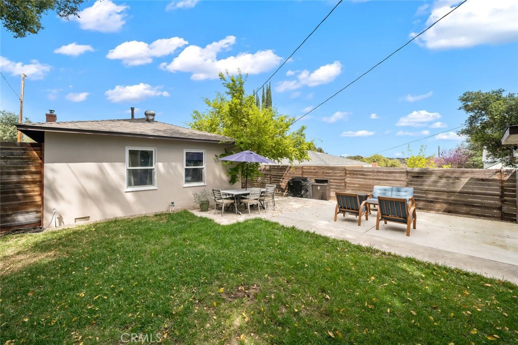 104 16th Street Paso Robles, CA 93446 - Photo 34 of 40 a view of a backyard with sitting area