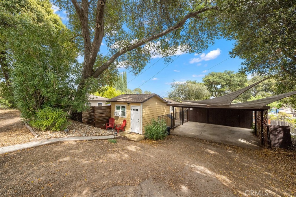 104 16th Street Paso Robles, CA 93446 - Photo 36 of 40 a view of house with a yard and potted plants