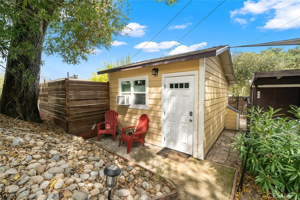 104 16th Street Paso Robles, CA 93446 - Photo 38 of 40 a view of a house with backyard and sitting area
