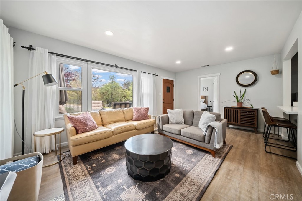 104 16th Street Paso Robles, CA 93446 - Photo 7 of 40 a living room with furniture and a large window