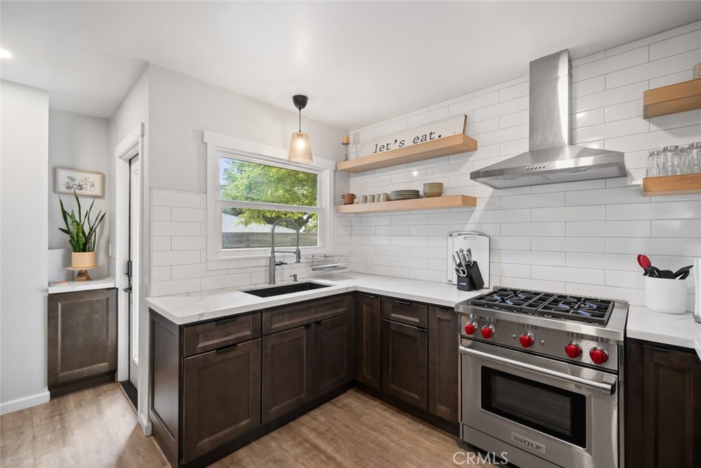 104 16th Street Paso Robles, CA 93446 - Photo 9 of 40 a kitchen with a sink stove and cabinets