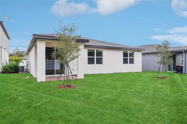 a house view with a garden space