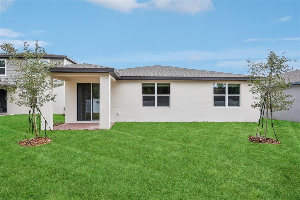 28009 Poppy Court Leesburg, FL 34748 - Photo 33 of 35 a house view with a garden space