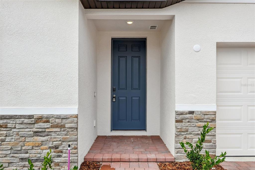 28009 Poppy Court Leesburg, FL 34748 - Photo 35 of 35 a view of a hallway with wooden floor