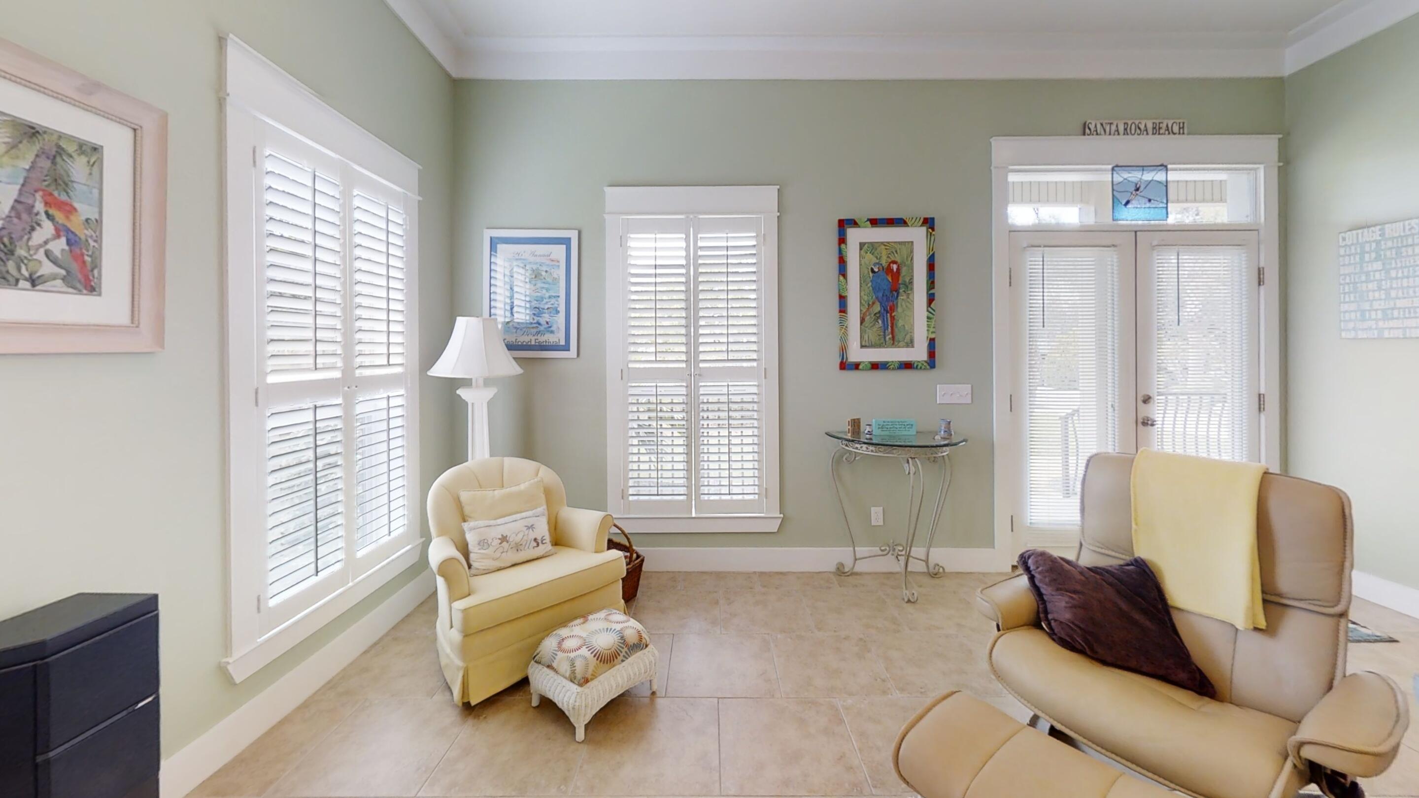 192 Birch Street Santa Rosa Beach, FL 32459 - Photo 14 of 51 a living room with furniture and a window