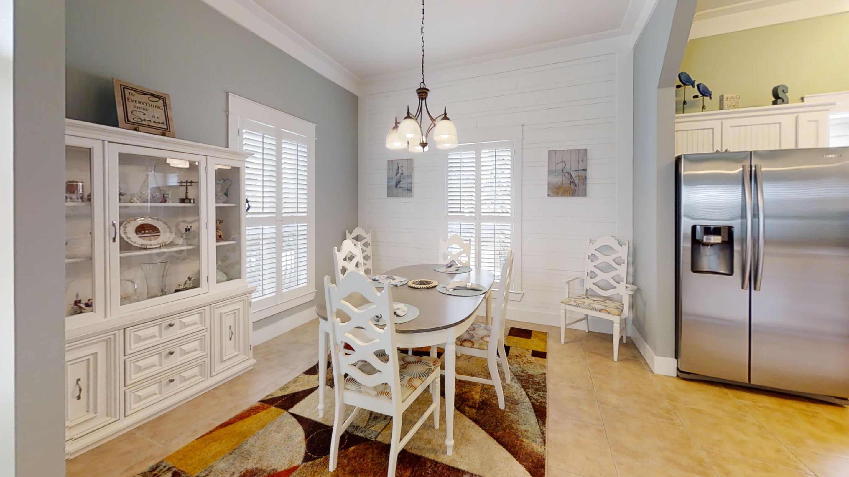 192 Birch Street Santa Rosa Beach, FL 32459 - Photo 24 of 51 a dining room with furniture and window