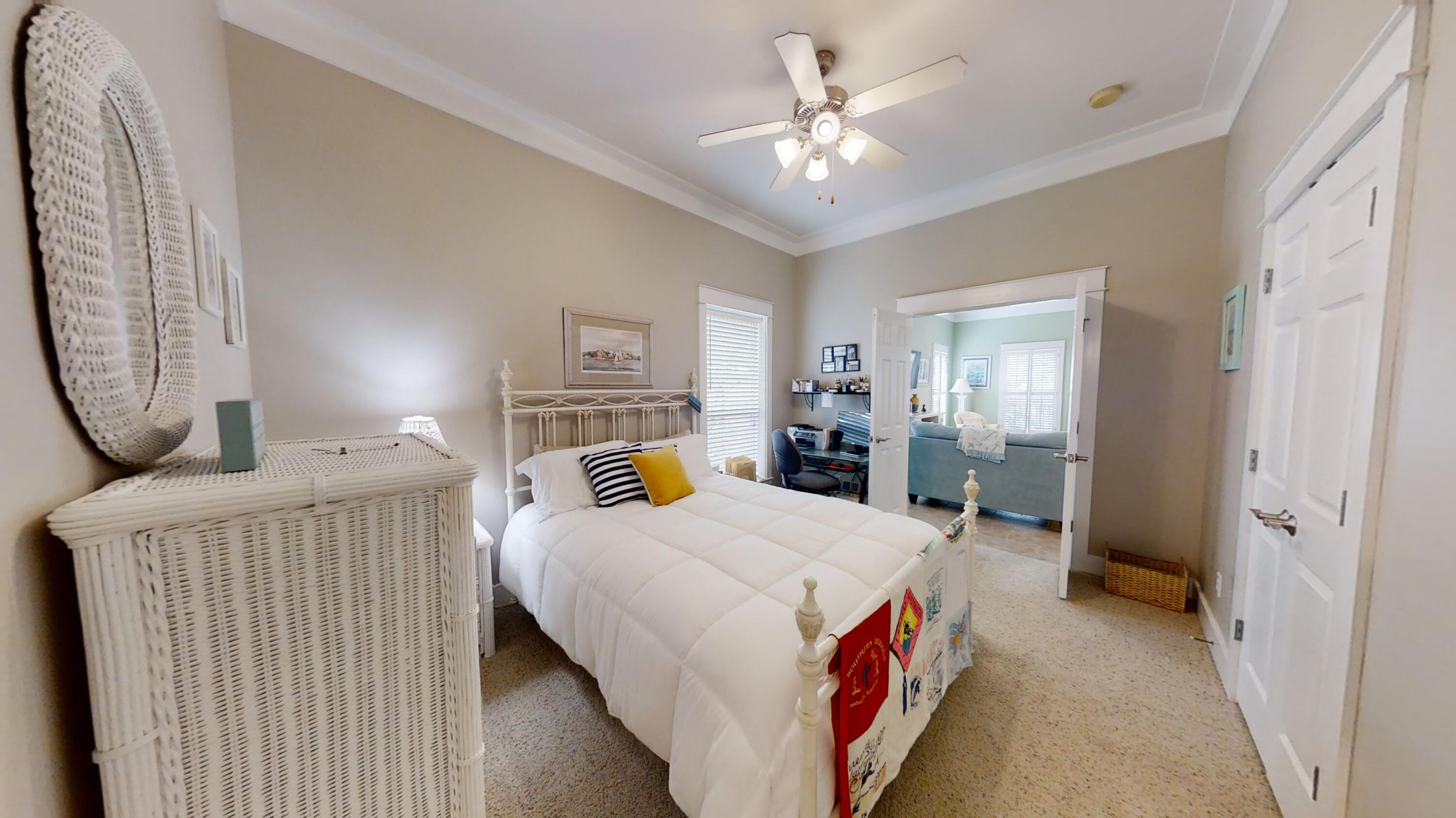 192 Birch Street Santa Rosa Beach, FL 32459 - Photo 26 of 51 a bed room with a bed and a chandelier