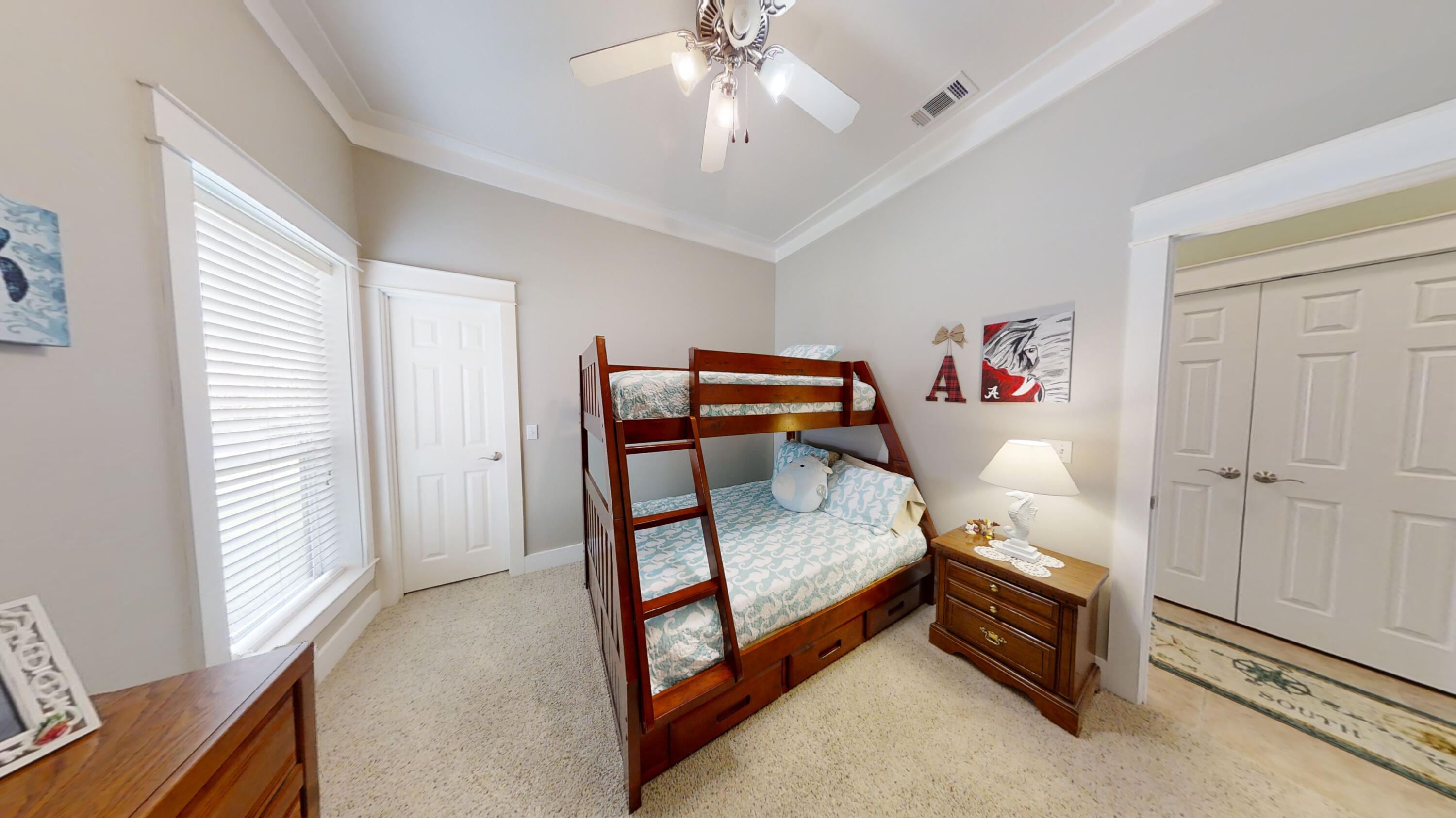 192 Birch Street Santa Rosa Beach, FL 32459 - Photo 31 of 51 a bedroom with furniture and a window