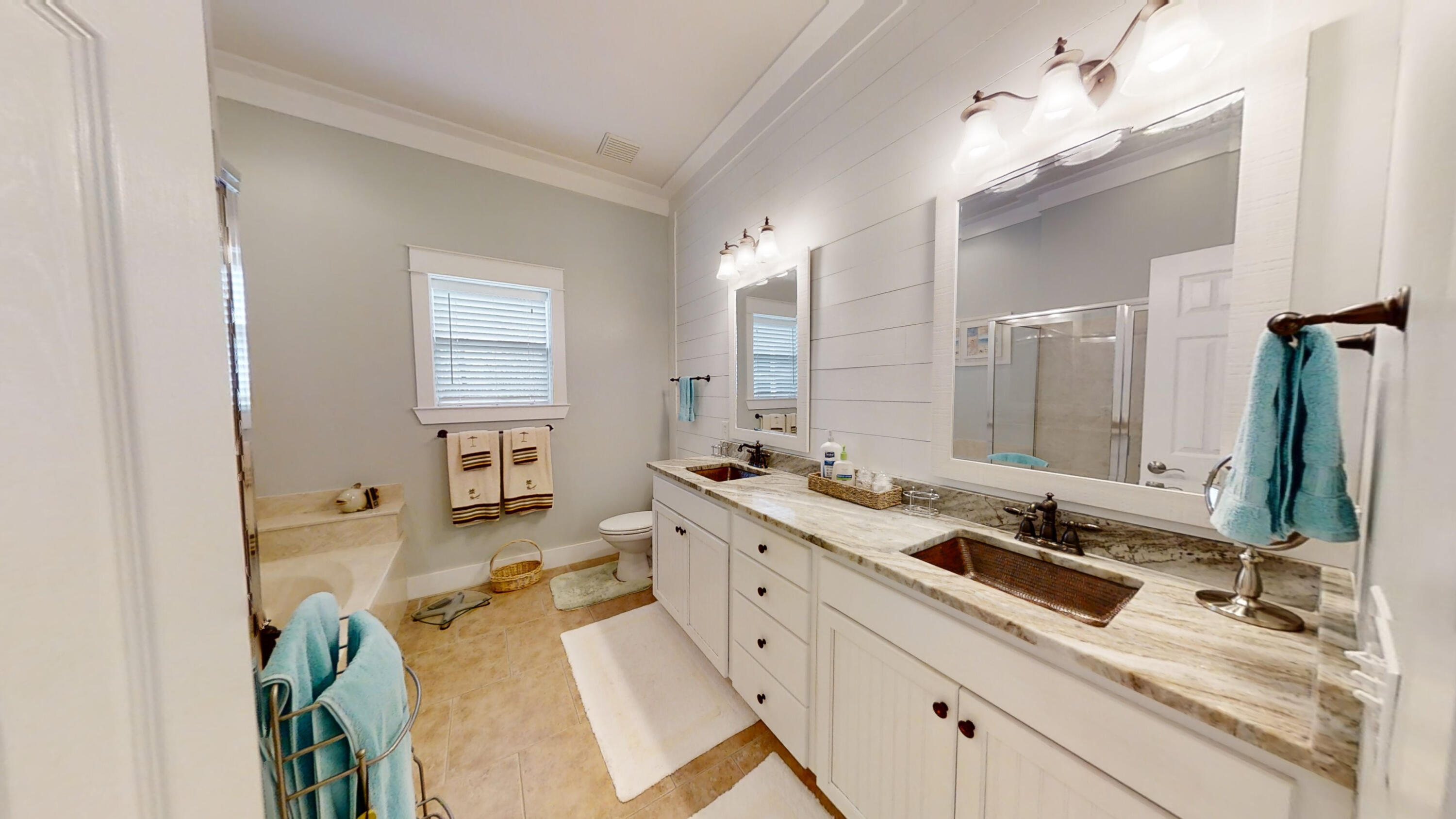 192 Birch Street Santa Rosa Beach, FL 32459 - Photo 37 of 51 a spacious bathroom with a double vanity sink mirror and