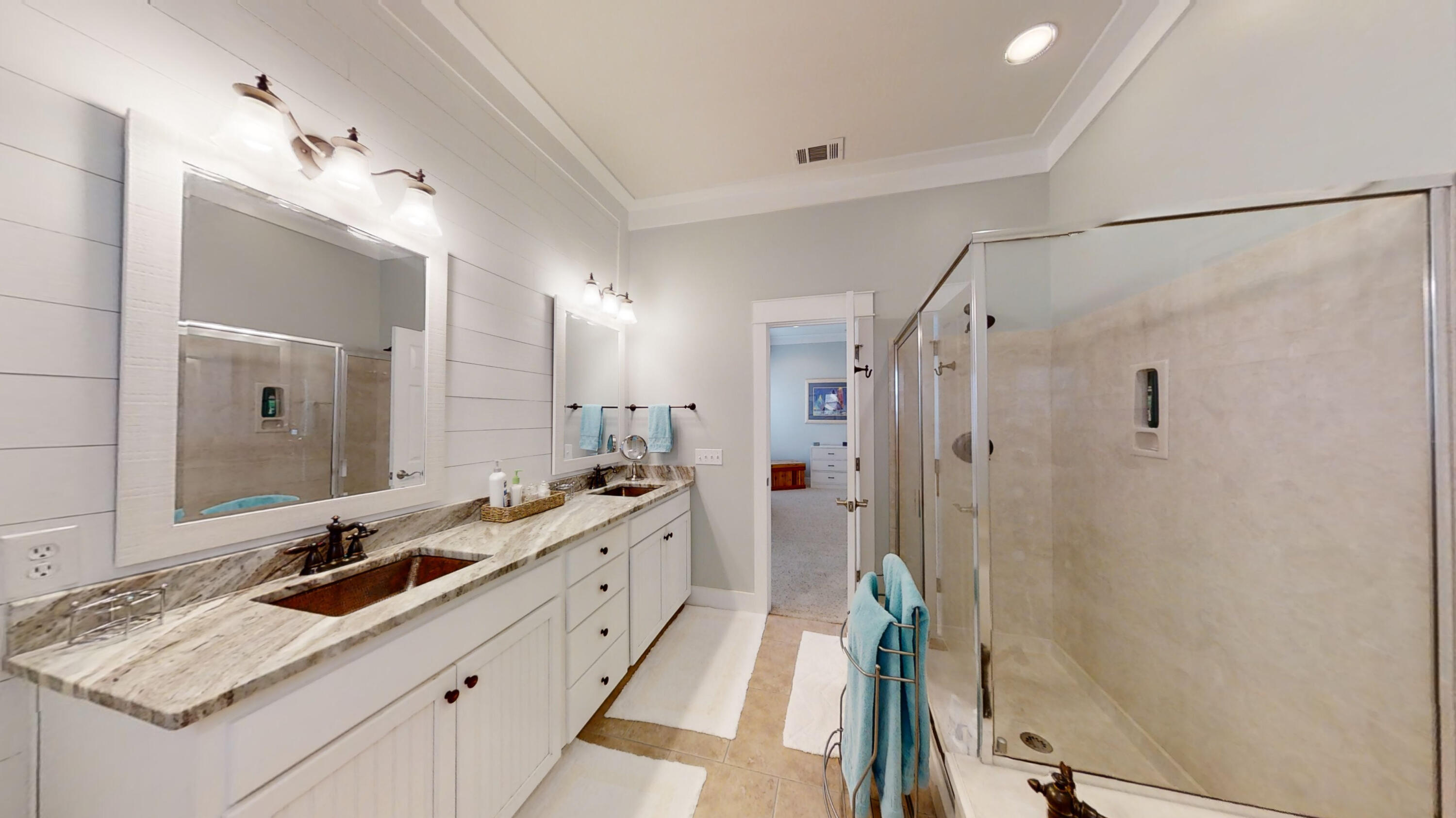 192 Birch Street Santa Rosa Beach, FL 32459 - Photo 39 of 51 a bathroom with a double vanity sink mirror double and shower