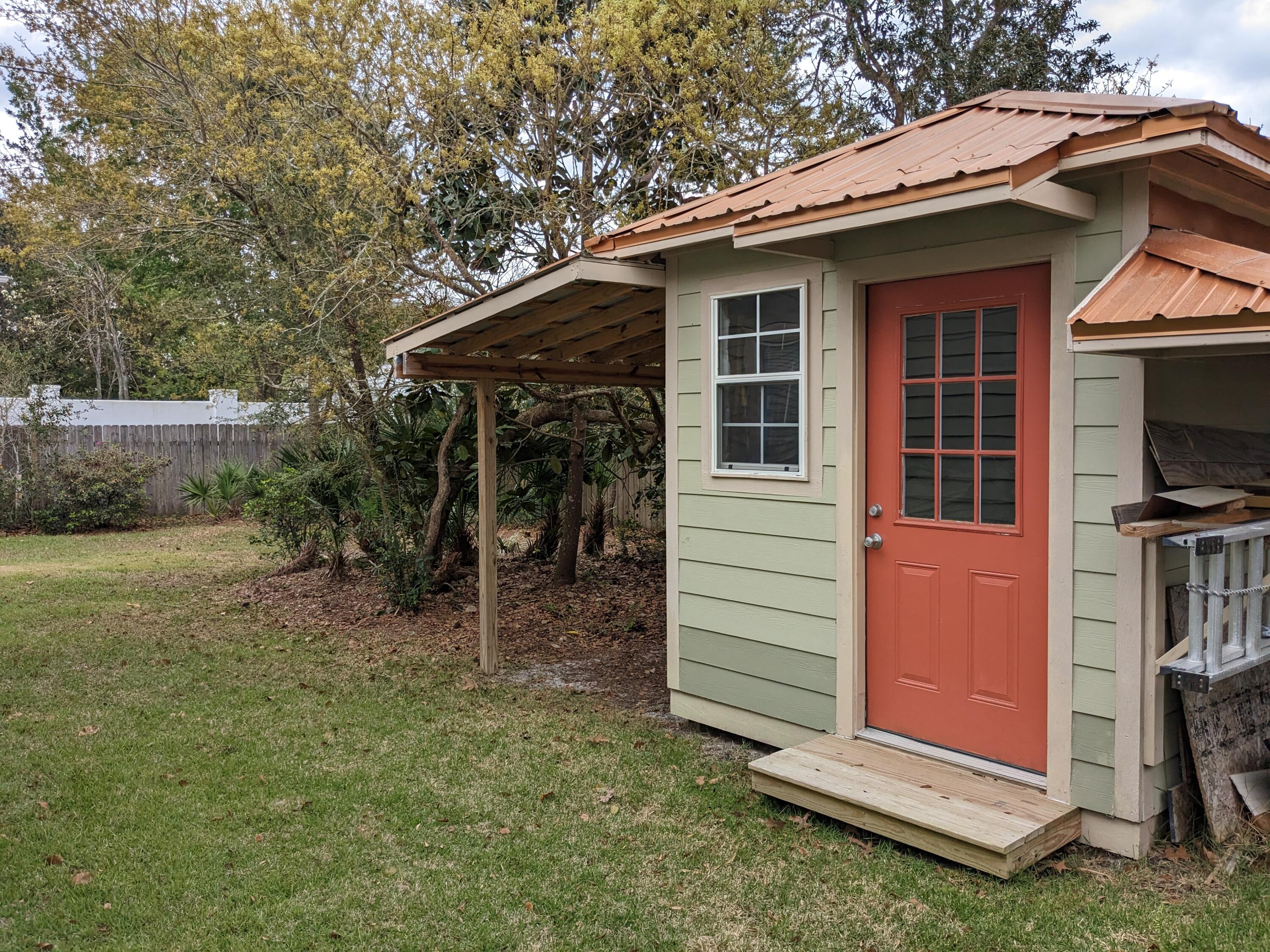 192 Birch Street Santa Rosa Beach, FL 32459 - Photo 47 of 51 a view of backyard of house with green space