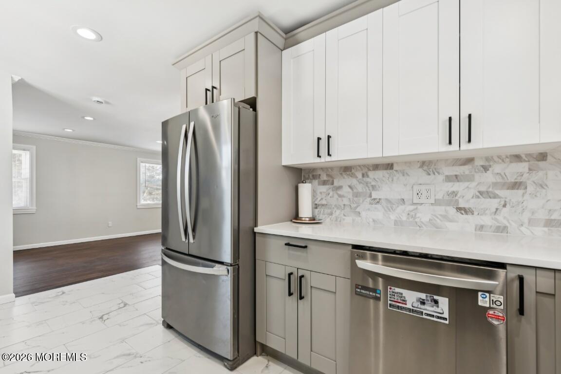 96 Twin Rivers Drive Toms River, NJ 08753 - Photo 13 of 37 a kitchen with stainless steel appliances granite countertop a refrigerator and a stove