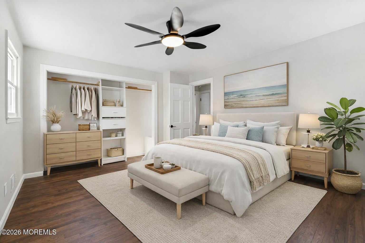 96 Twin Rivers Drive Toms River, NJ 08753 - Photo 18 of 37 a spacious bedroom with a bed and a chandelier
