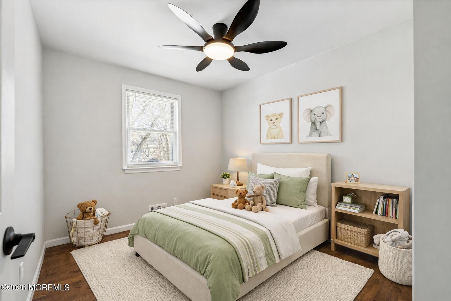 96 Twin Rivers Drive Toms River, NJ 08753 - Photo 23 of 37 a bedroom with a bed and a painting on the wall