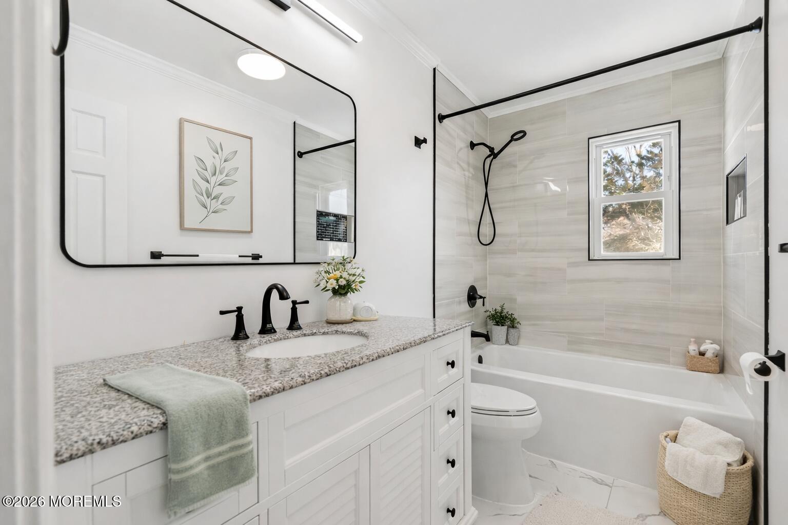 96 Twin Rivers Drive Toms River, NJ 08753 - Photo 26 of 37 a bathroom with a granite countertop sink a toilet and shower