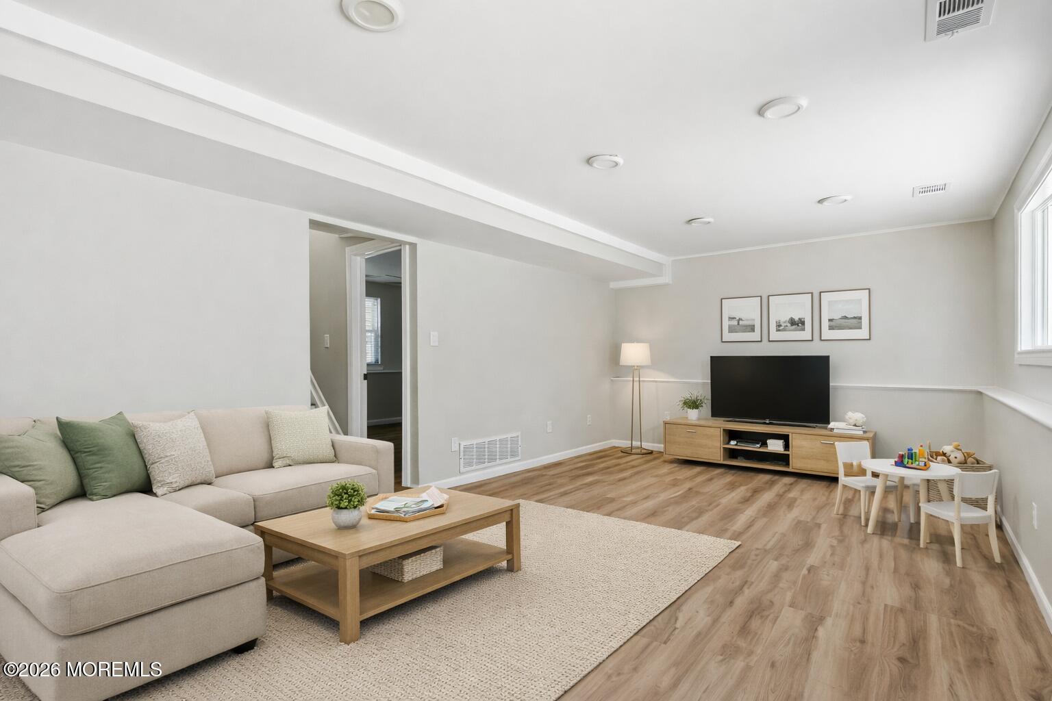 96 Twin Rivers Drive Toms River, NJ 08753 - Photo 33 of 37 Virtually Staged (Family Room Pic 2)