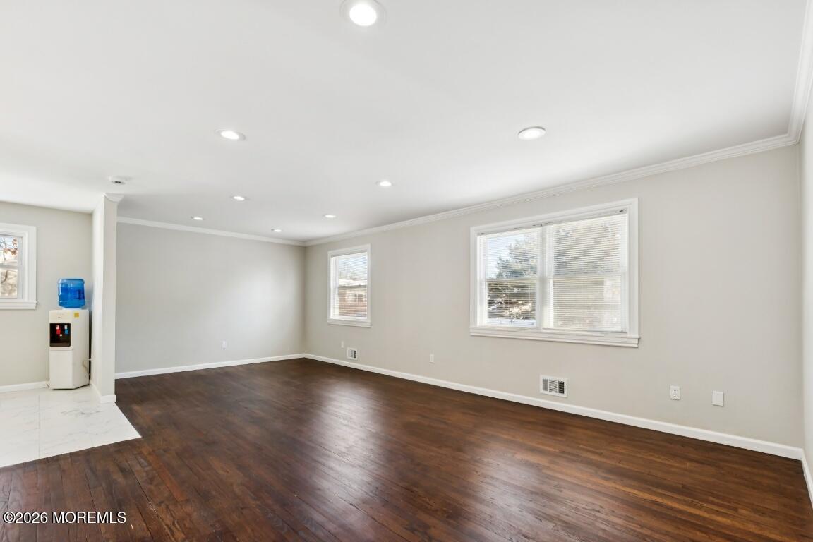 96 Twin Rivers Drive Toms River, NJ 08753 - Photo 4 of 37 a view of a big room with wooden floor and windows